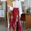 New Chinese style Hanfu heavy industry embroidery, cloud shoulder standing collar shirt, paired with woven gold horse face skirt, wedding engagement dress. 