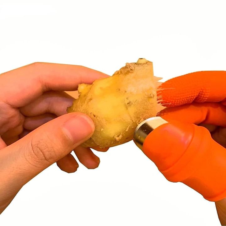 Silicone%20Vegetable%20And%20Fruits%20Thumb%20Cutter%20Finger%20cutter%205%20in%201%20-%20Image%207