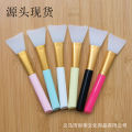 Facial mask applicator makeup brush. 