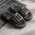 Simple couple leaky slippers women's home indoor home eva-feeling sandals men's bathroom bath wholesale.