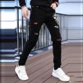 Men's Autumn New European Station Personality Trend Head Print Rhinestone Casual Ankle Banded Pants Denim Trousers Men. 