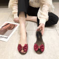 Plastic sandals women's transparent flat non-slip Korean version of beach shoes seaside vacation metal bow fish mouth jelly shoes.