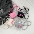 Children's Bag New Creative Bow Colored Mini Square Bag Sweet Girl Crossbody Bag Mouth Red Bag Girl side bags for girls.