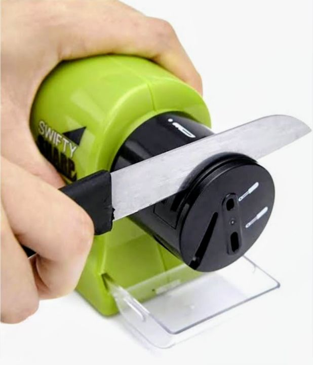Sharp%20Motorized%20Knife%20Sharpener%20%E2%80%93%20Electric%20Blade%20Sharpener%20for%20Knives,%20Scissors%20&%20Chef%20Tools%20%7C%20Sharp%20Kitchen%20Tool%20with%20Motor,%20Battery,%20Safety%20Guard%20&%20Transparent%20Tray%20%7C%20-%20Image%206
