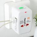 All in 1 UNIVERSAL WORLD TRAVEL ADAPTER with 2 USB Port Charger Plug.