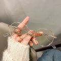 Korean Fashion Retro Anti-Blue Light Glasses Metal Round Frame Women Girls Elegant Eyeglasses Computer Eye Protection Spectacles.