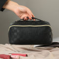 Simple checkered net red pillow makeup bag, high value, portable, waterproof, multi-functional washing and storage bag cross.