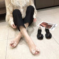 Plastic sandals women's transparent flat non-slip Korean version of beach shoes seaside vacation metal bow fish mouth jelly shoes.