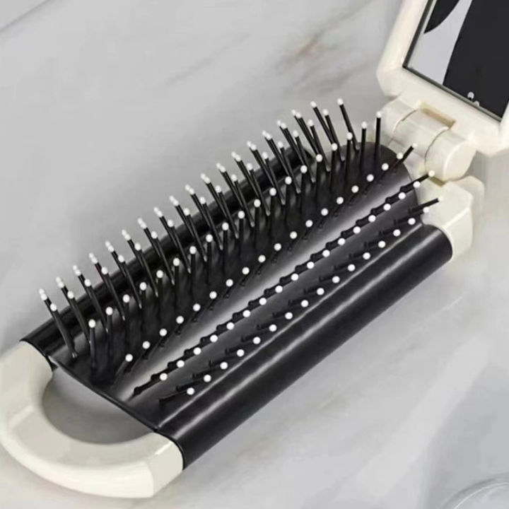 Cute%20Folding%20Airbag%20Comb%20With%20Mirror%20Silicone%20Cartoon%20Folding%20Combs%20Girls%20Women%20Portable%20For%20Travel%20Head%20Massager%20Relax-MOILY%20-%20Image%204
