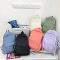 Casual large-capacity backpack ins style fashion girls Korean version solid color simple college student schoolbag travel backpack. 