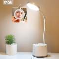 Rechargable desk lamp with pen holder.