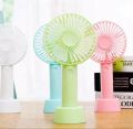 Portable mini rechargeable travel fan for indoor and outdoor use. 