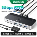 UGREEN USB 3.0 Switch 2 Computers Sharing USB C and A Devices, 4 Port USB Switcher Shareing Keyboard and Mouse, Printer Scanner USB Switch Hub for Two Computers with 2 USB3.0 Cables and Remote. 