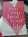 You Can Heal Your Life by Louise Hay  (Premium Paperback). 