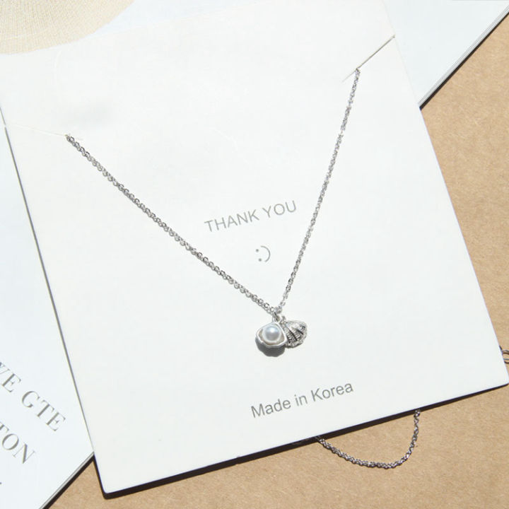 Necklace%20/%20Korean%20design%20silver%20plated%20shell%20pearl%20locket%20necklace%20for%20women%20and%20girls%20-%20Image%2010