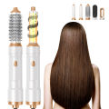 Multi functional five in one hot air multi head automatic curler, straight comb, hair dryer, curling rod. 