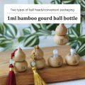 1ml Roller Bottle Refillable Ancient Style Gourd Shape Empty Bottle Bamboo Small Skincare Container for Travel Personal Care.