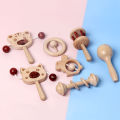Newborn tambourine 3-6 months baby solid wood hand ringing toy can be chewed, full moon gift 0-1 years old. 