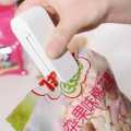 Multifunctional Household Mini Portable Super Sealer Handy Plastic Bag Sealer Sealing Machine. 