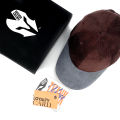 HEAD GEAR CHOCOLATE GREY DUAL TONE CORD CAP. 