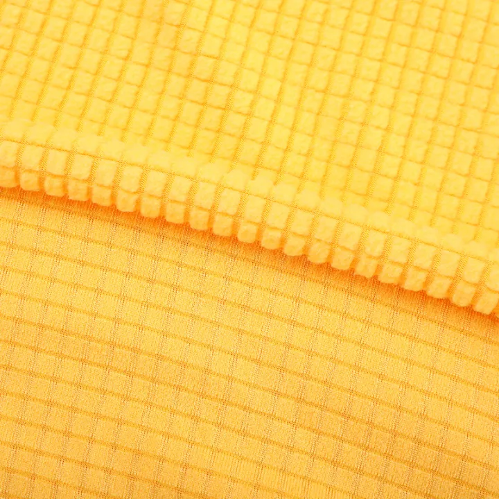 Single-sided%20polar%20fleece,%20polyester%20ammonia,%20three-dimensional%20jacquard%20knitted%20fabric,%20elastic%20pineapple%20lattice%20fabric,%20sofa%20cover,%20chair%20cushion%20in%20stock%20-%20Image%205