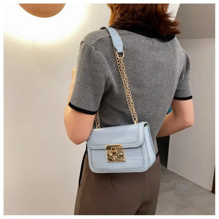 A%20shoulder%20women's%20bag,%20a%20foreign%20bag,%20a%20fashion%20texture%20chain,%20a%202023%20new%20stone%20pattern,%20a%20simple%20bag,%20a%20crossbody%20lock,%20a%20small%20square%20bag%20-%20Image%202