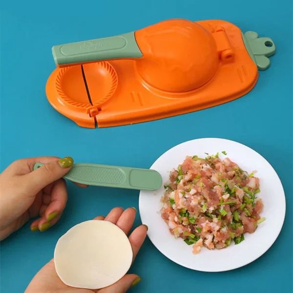 Dumpling%20Maker%202%20In%201%20Dumpling%20Mold%20Pressure%20Manual%20Wrapper%20Making%20Plastic%20Mold%20Dough%20Pressing%20Tool%20Kitchen%20Baking%20Accessories%20With%20Spoon%20Kuli%20Pitha%20maker%202%20in%201%20magic%20pitha%20maker%20,momo%20maker%20-%20Image%204