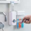Automatic Toothpaste Dispenser with Toothbrush Holder. 