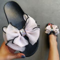 Cross-border Amazon AliExpress spot wholesale women's one-word sandals bow bright diamond slippers casual sandals on behalf of delivery.
