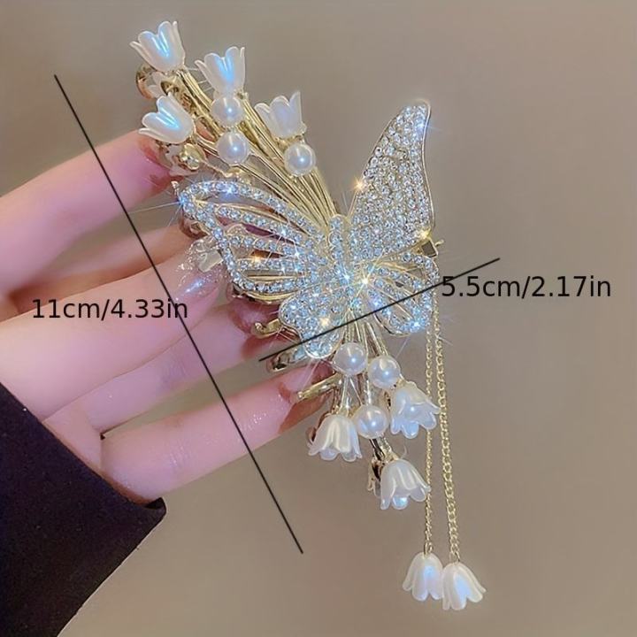 Large%20Butterfly%20Hair%20Claw%20Clips%20Gold%20Flower%20Lily%20of%20The%20Valley%20Violet%20Hair%20Claw%20Clips%20with%20Tassel%20Metal%20Pearl%20Nonslip%20Clamps%20Hair%20Styling%20Accessories%20for%20Thick%20Long%20Hair%20Women%20-%20Image%209