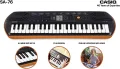 Casio SA-76 Portable Musical Keyboard Piano - Black & Orange with adapter. 