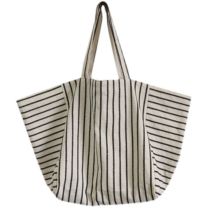 Canvas%20bag%20women's%20ins%20one-shoulder,%20large-capacity,%20lazy%20wind,%20striped%20fashion,%20big%20bag,%20casual%20literary%20hand-tote%20bag%20women%20-%20Image%205