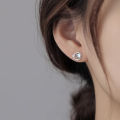 Light luxury micro inlaid zircon surround stud earrings women's simple fashion exquisite elegance S925 silver pin earrings net red earrings trend. 