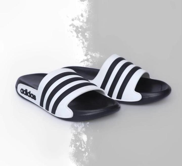 Men%E2%80%99s%20Adidas-PUMA%20Style%20Black%20&%20White%20Slide%20Slippers%20%E2%80%93%20Lightweight,%20CoMen%E2%80%99s%20Black%20&%20White%20Striped%20Casual%20Slides%20%E2%80%93%20-%20Image%207