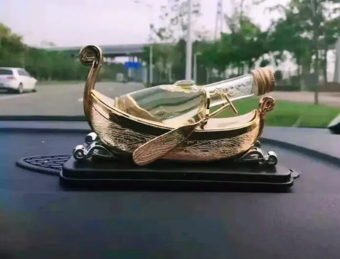 Boat%20shape%20Car%20perfume%20Show%20piece,%20Air%20Freshner,%2001%20piece,%20Sent%20Random%20Color%20-%20Image%204