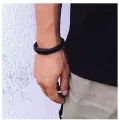 Elegant Stainless Steel Bracelet for Men - Fashionable High-Quality Metal Bracelet with Brand Logo.