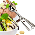 stainless steel ice cream scoop spoon with a trigger release mechanism..