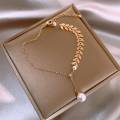 Trendy Fashionable Pearl Leaf Chain Golden Bracelets for Girls Charm Jewelry - Bracelet for Women Simple Fashion New Collection. 