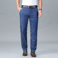 2023 New Spring Men's Light Blue Stretch Straight Jeans Business Casual Denim Pants Modal Fabric Trousers Male Brand.