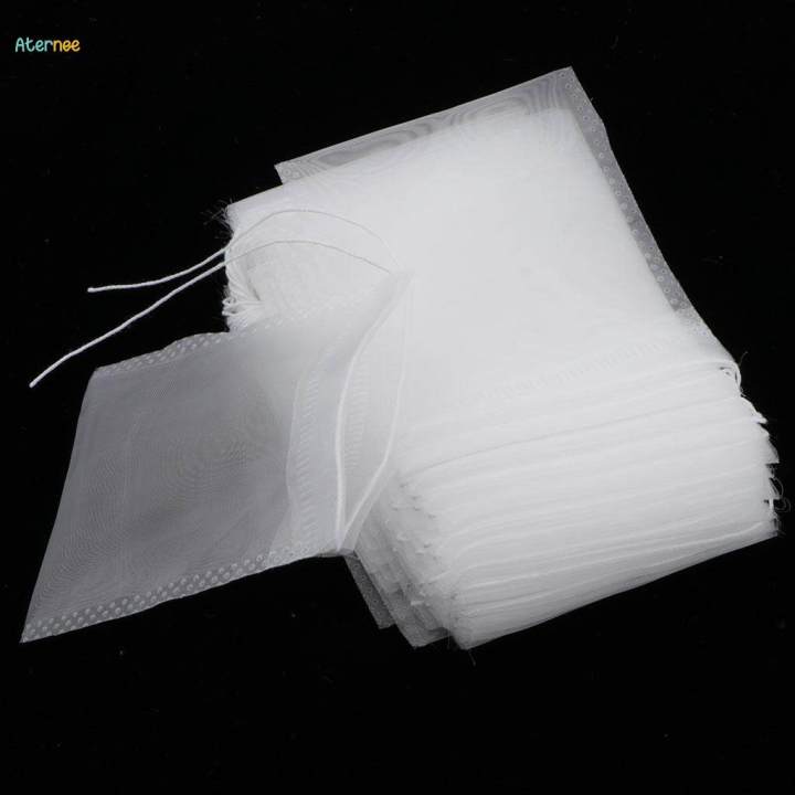 4x50PCS%20Empty%20Mesh%20Tea%20Filter%20Bags%20Loose%20Herbs%20Teabag%20with%20Drawstring%205x6cm%20-%20Image%209