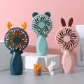 Handheld Fan Cartoon Summer Desktop Student Mini Electric Fan USB Charging Portable Mini Astro Fan.