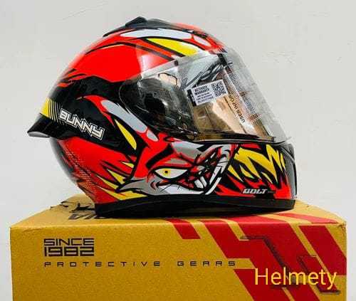 Vega Bolt Bunny Glossy Orange full face helmet with dual certification.