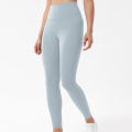 Solid color yoga pants with high waist pockets for women's fitness, running, quick drying, breathable women's yoga leggings. 