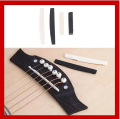 Upper Lower String Pillow Universal Acoustic Electric Guitar Bridge Saddle Black And White color for acoustic guitar. 