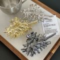 Muweordy Creativity Unique Colorful Alien Metal Conch Hair Claws for Women Girl Y2K Hollow Shell Crab Hair Clip Hair Accessories.