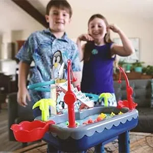 Tido%20Toys%20Fishing%20Game%20for%20Kids%20-%20An%20Interactive%20Party%20Toy%20with%20Electronic%20Slide%20Magnetic%20Pond,%203%20Magnetic%20Penguin,%209%20Fish,%202%20Fishing%20Poles%20-%20Image%209