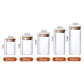 Eco-friendly Glass jar Sleek Transparent Bamboo lid Airtight Versatile Sealed canister for Kitchen accessories Loose tea. 
