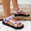 Foreign trade plus size beach shoes women's 2022 new European and American velcro bow round toe flat leopard print sandals women.