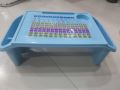 Small desk on plastic bed Children's writing study desk Children's multi-functional toy dining table.