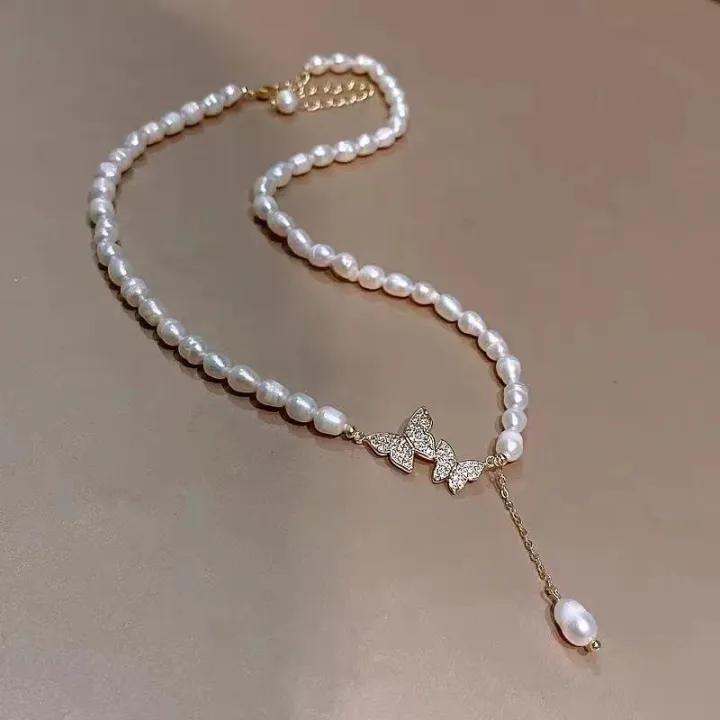 Bohemian%20Crystal%20Pearl%20Butterfly%20Necklace%20Vintage%20Y-Drop%20Fashion%20Choker%20Pendant%20Jewelry%20for%20Women%20and%20Girls%20-%20Image%204